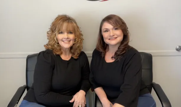 Open Arms co-founders Diane and Christina seated together